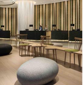 Aedas Interiors为香港诺富特世纪酒店大堂打造极简雕塑美学